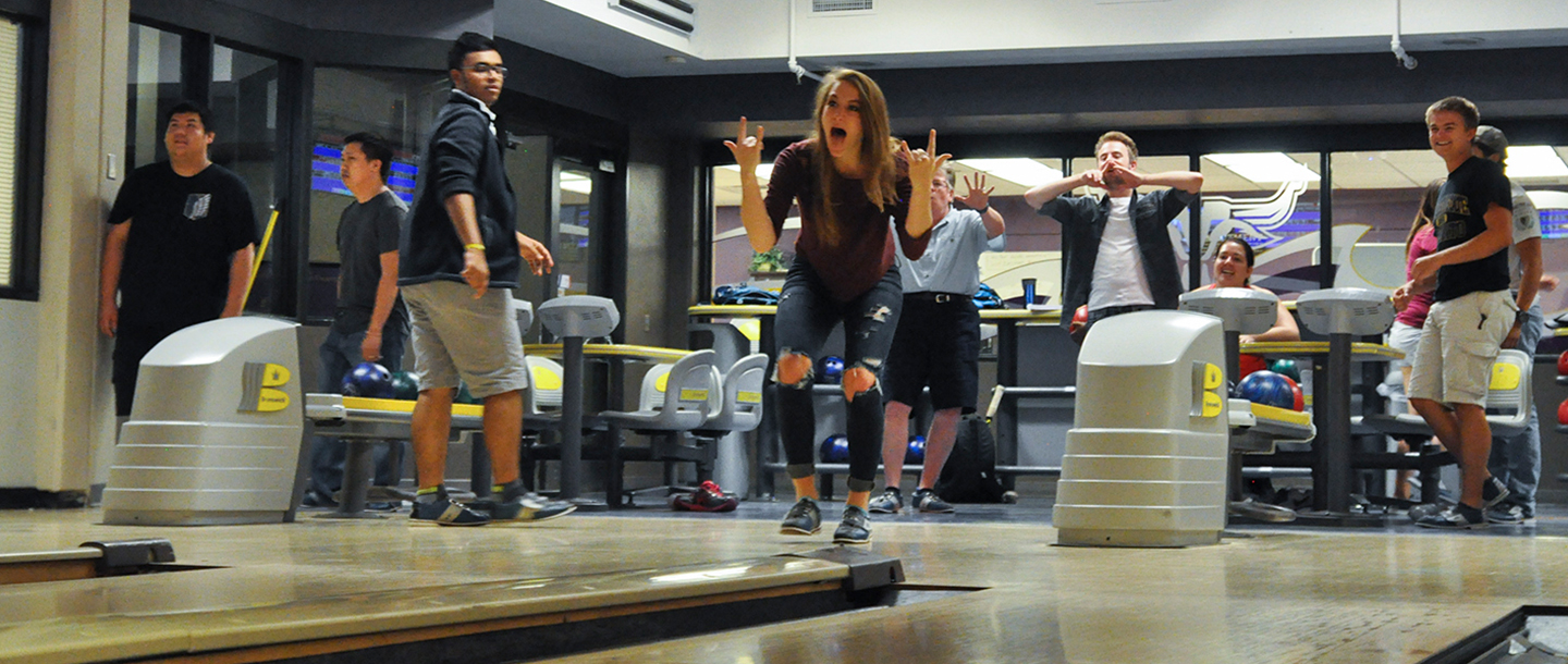 students playing bowling