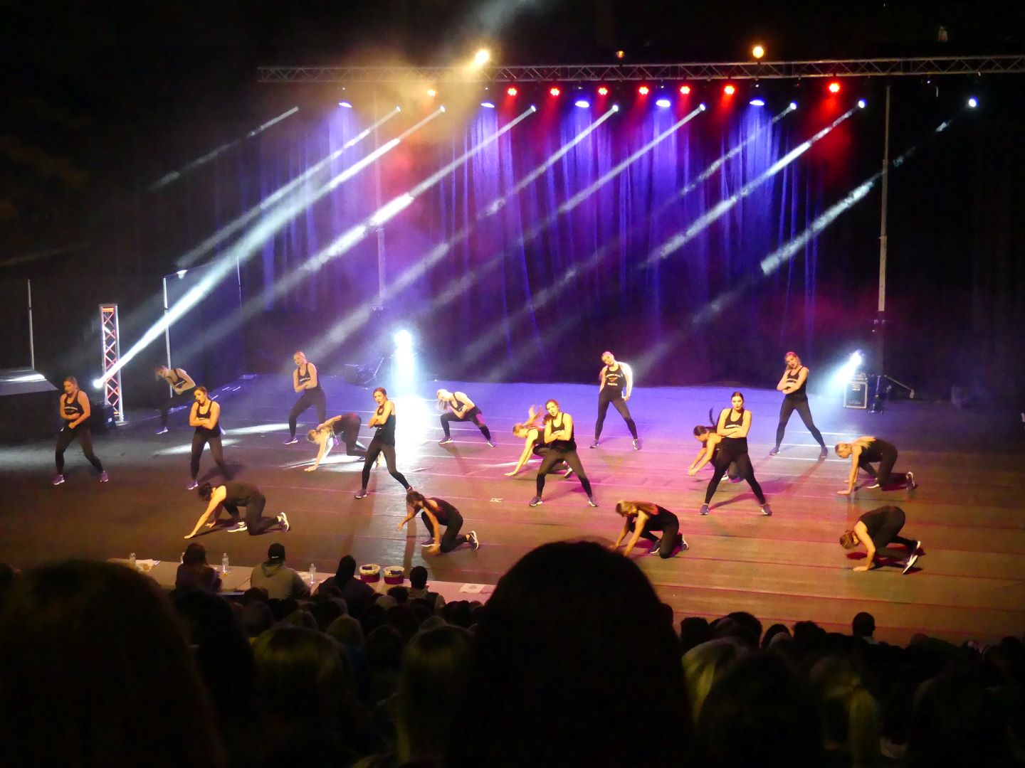 Dancers performing in theatre