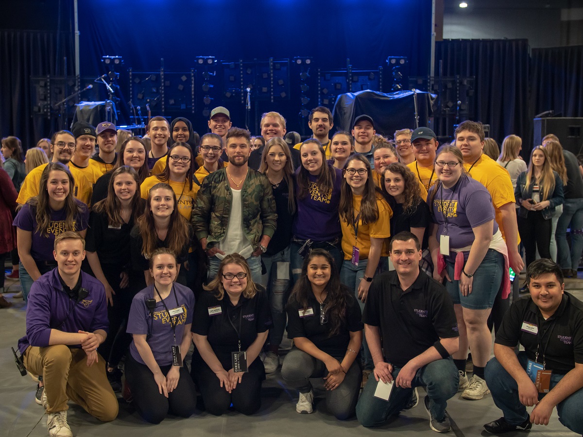 a group of people posing for a photo