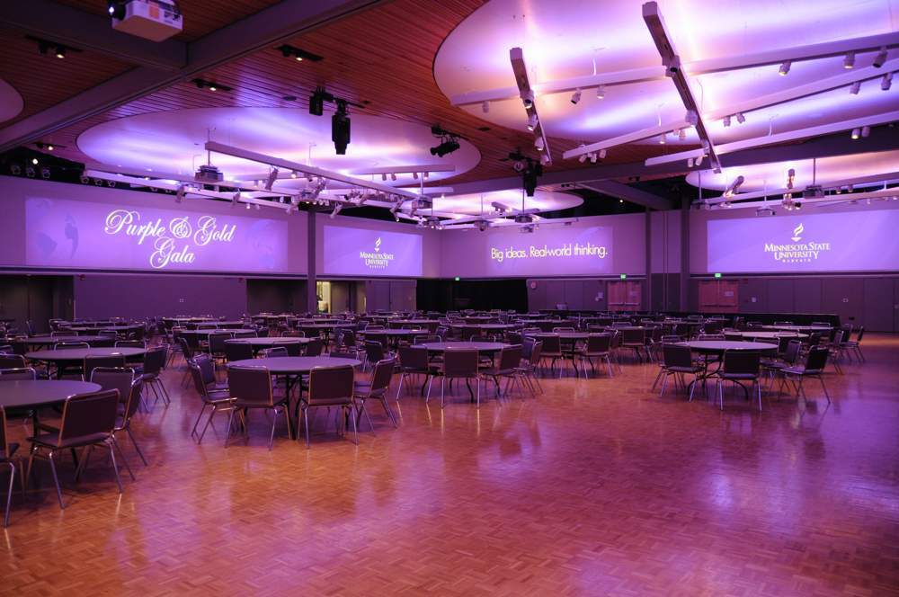 CSU Ballroom set up for an event titled the Purple and Gold Gala