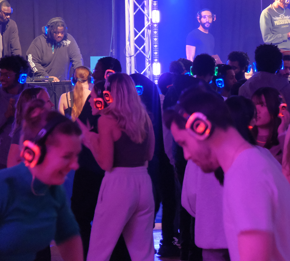 a group of people wearing headphones