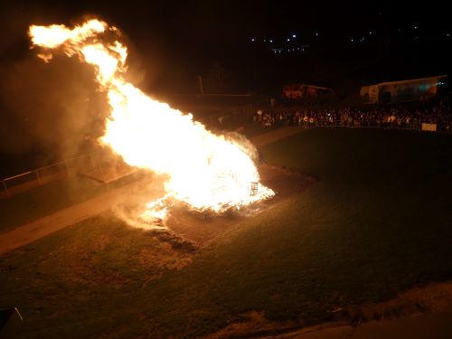 Aerial view of the homecoming bonfire at night