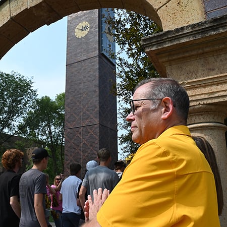 a person in a yellow shirt