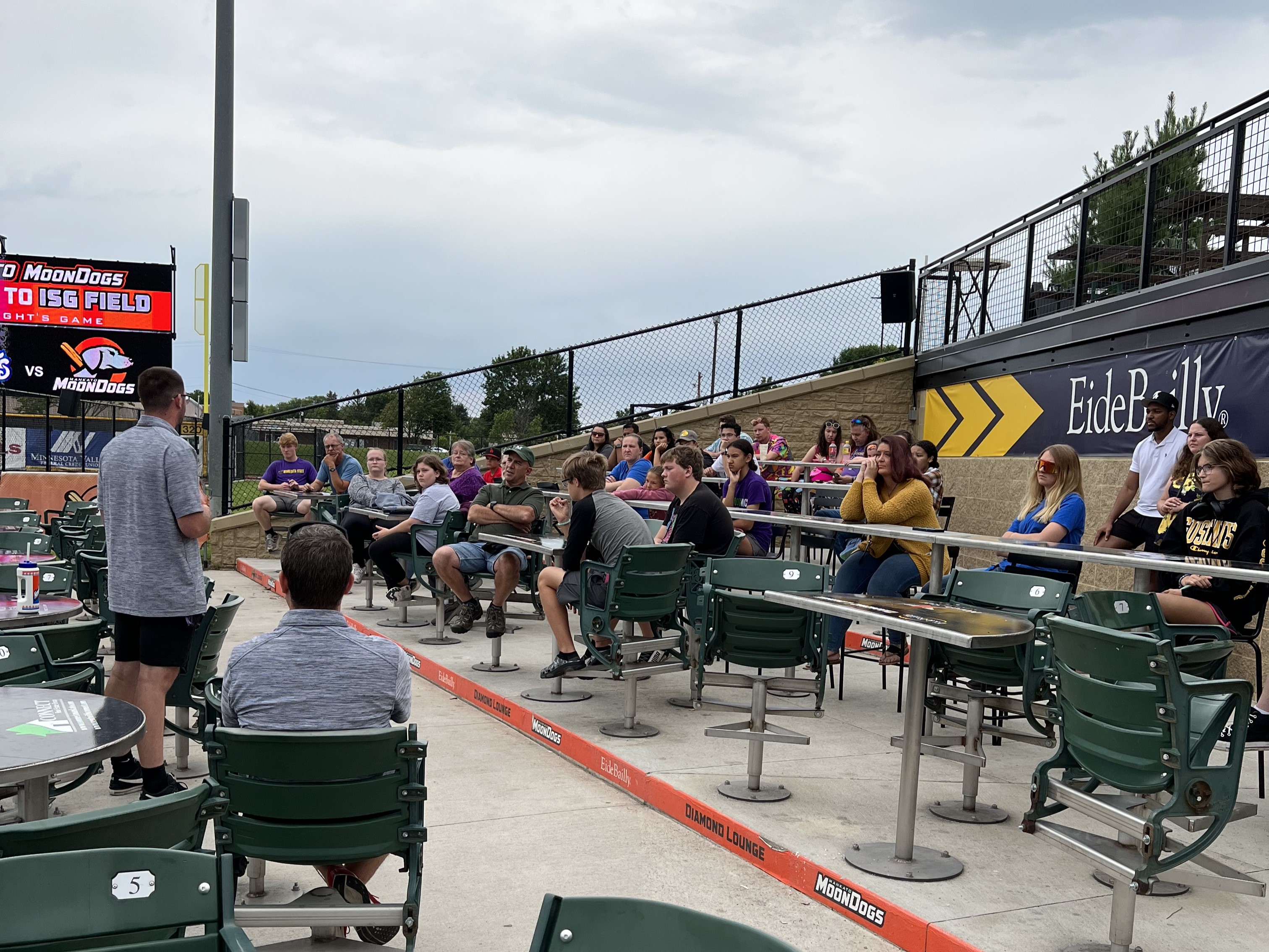 a group of people sitting in chairs