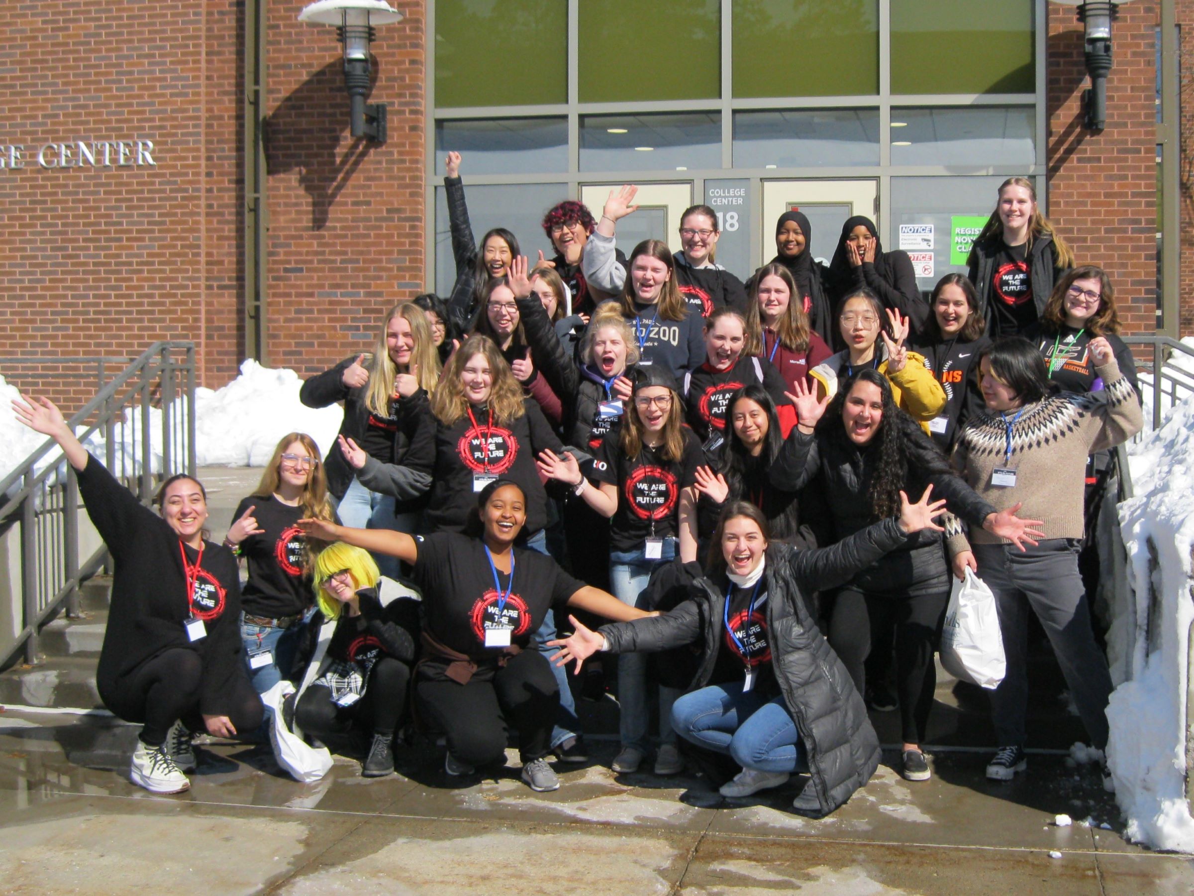 a group of people posing for a photo