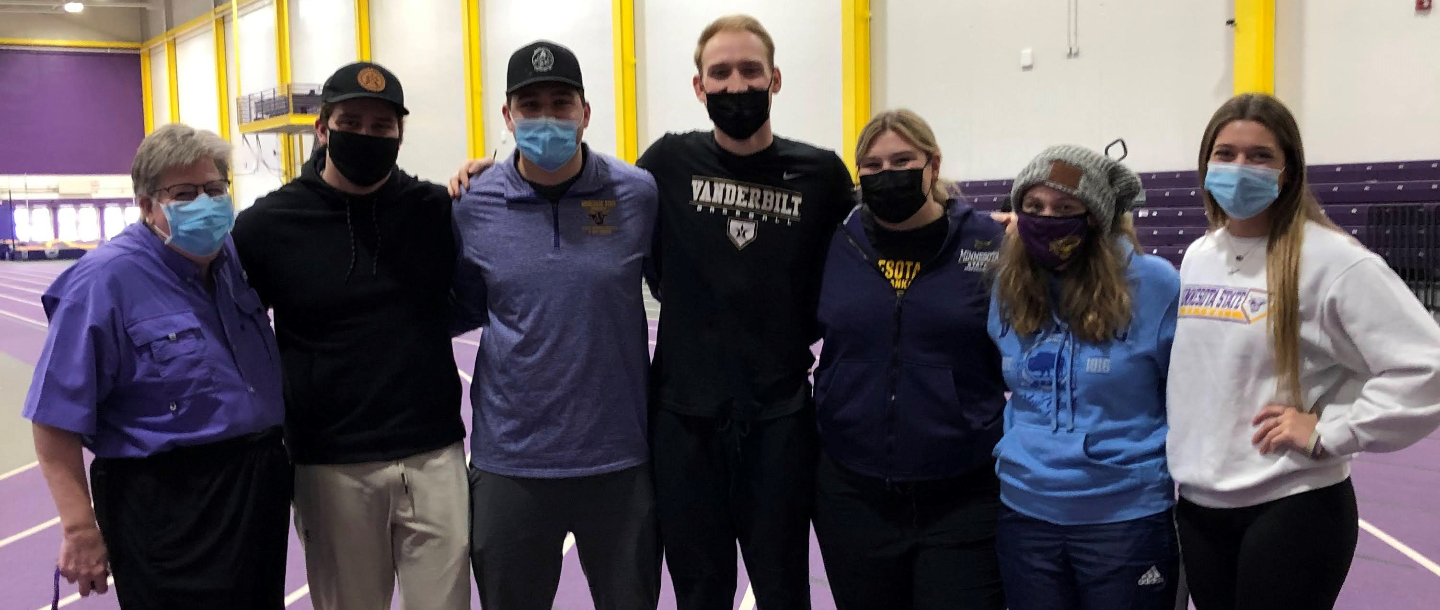 a group of people wearing face masks