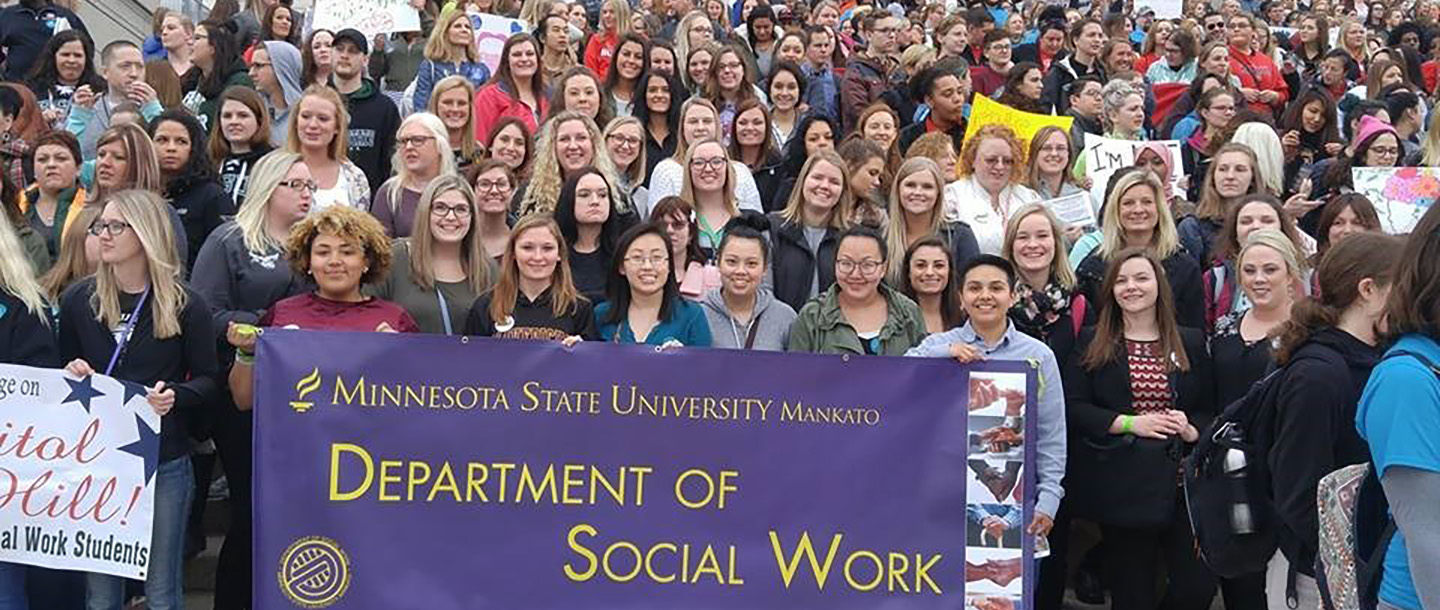 a group of people posing for a photo