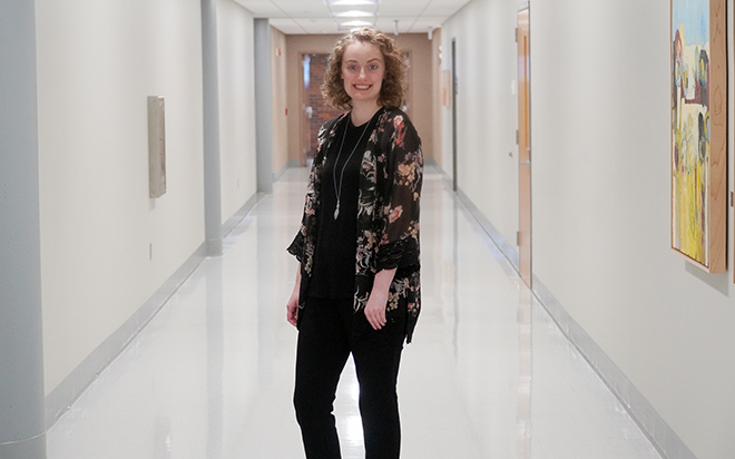 a person standing in a hallway