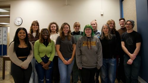 Minnesota State Mankato Department of Art and Design students with BECHS’s museum staff posing for a group photo at the Blue Earth County Historical Society museum