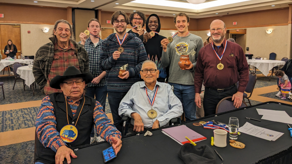 a group of people posing for a photo