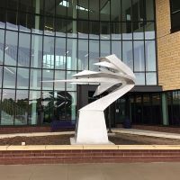 The Toward Tomorrow sculpture outside of the Clinical Sciences building 