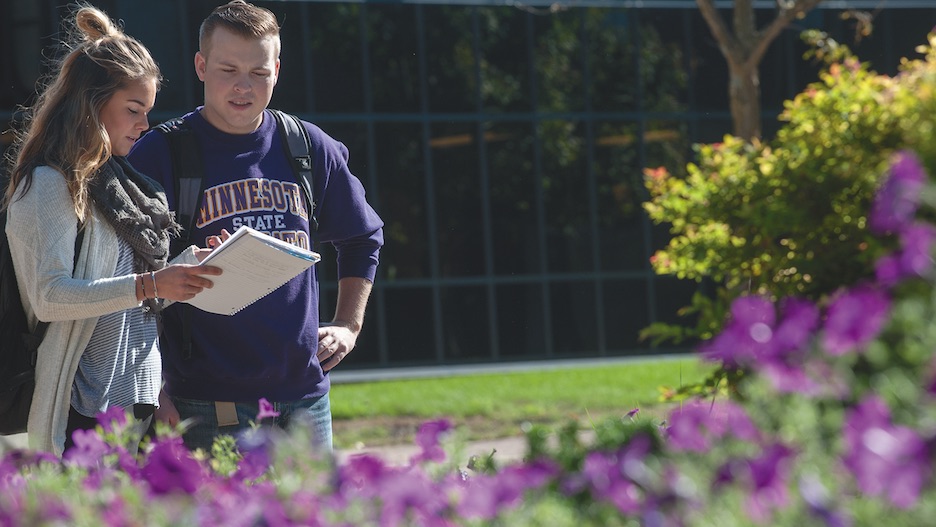 students looking at flowers