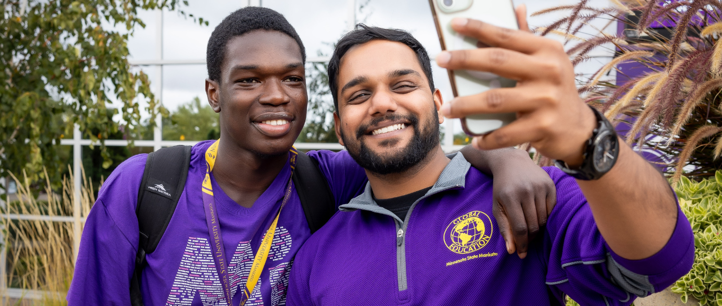 two men taking a selfie