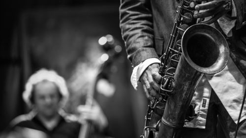 Black and white photo of a saxophone player