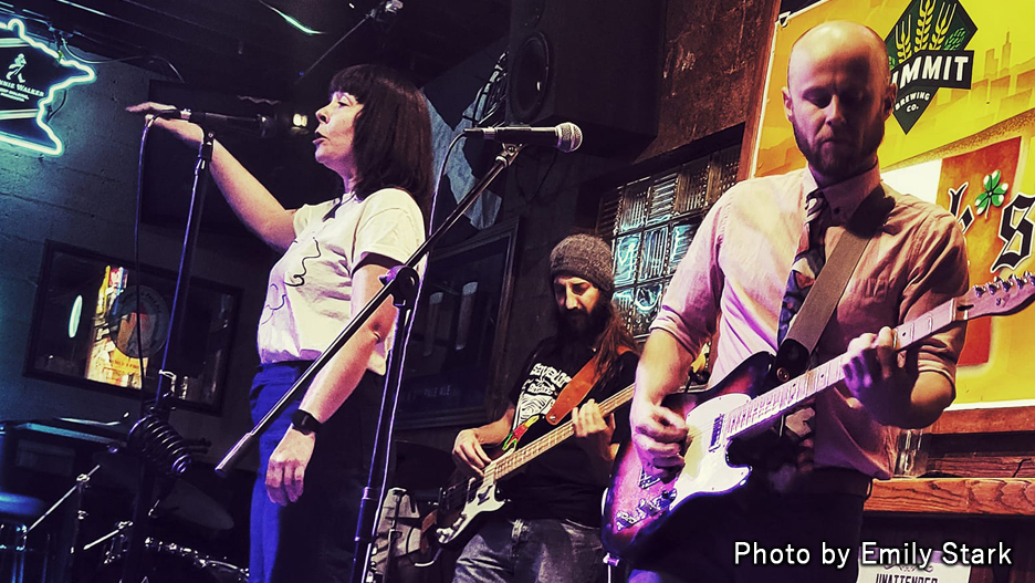 a group of people playing instruments