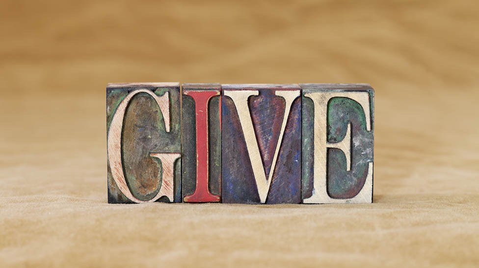 Blocks of the letters from the word give. 