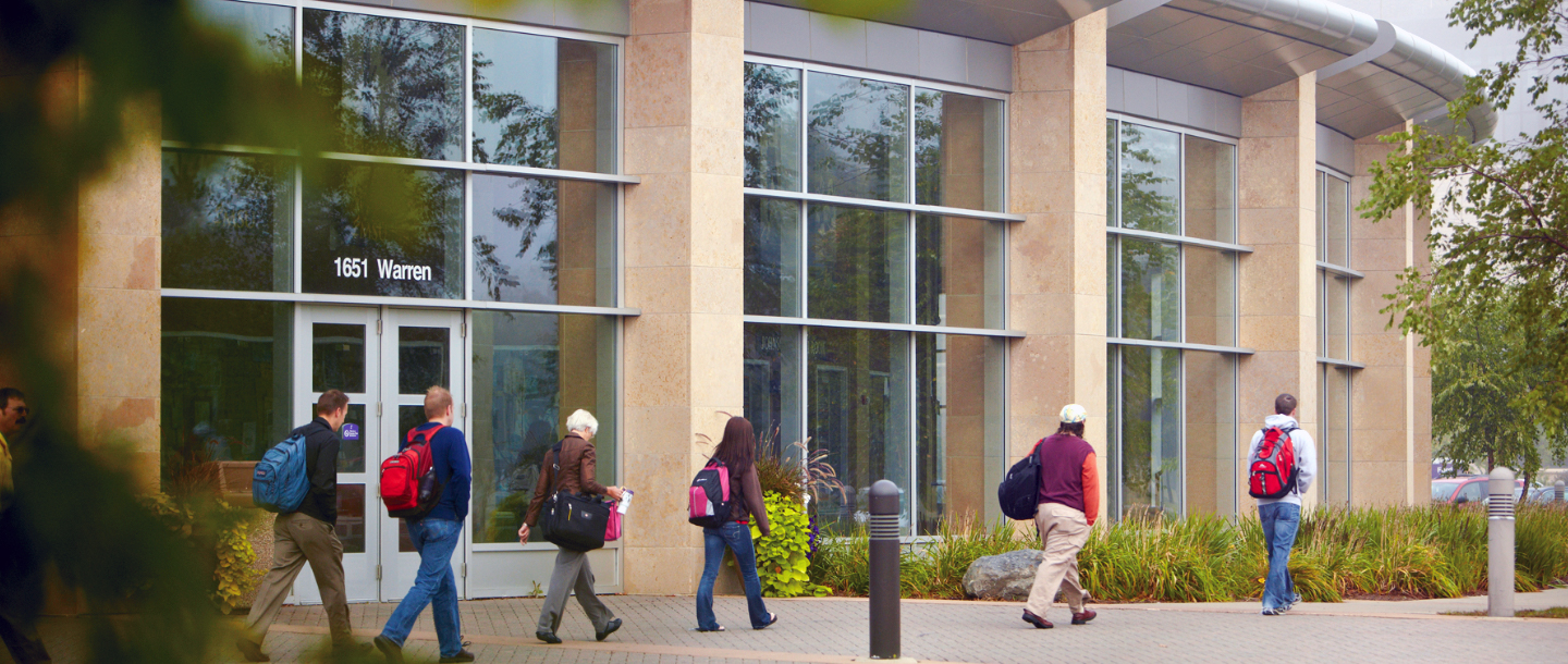 Students walking outside of the Taylor Center