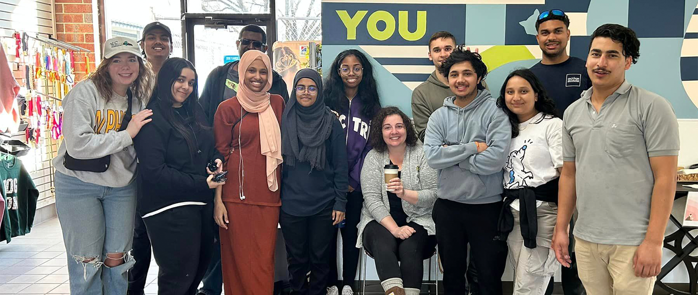 a group of people posing for a photo