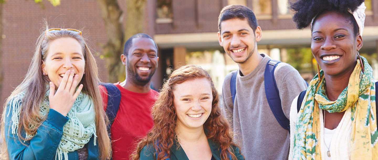 five students looking at camera