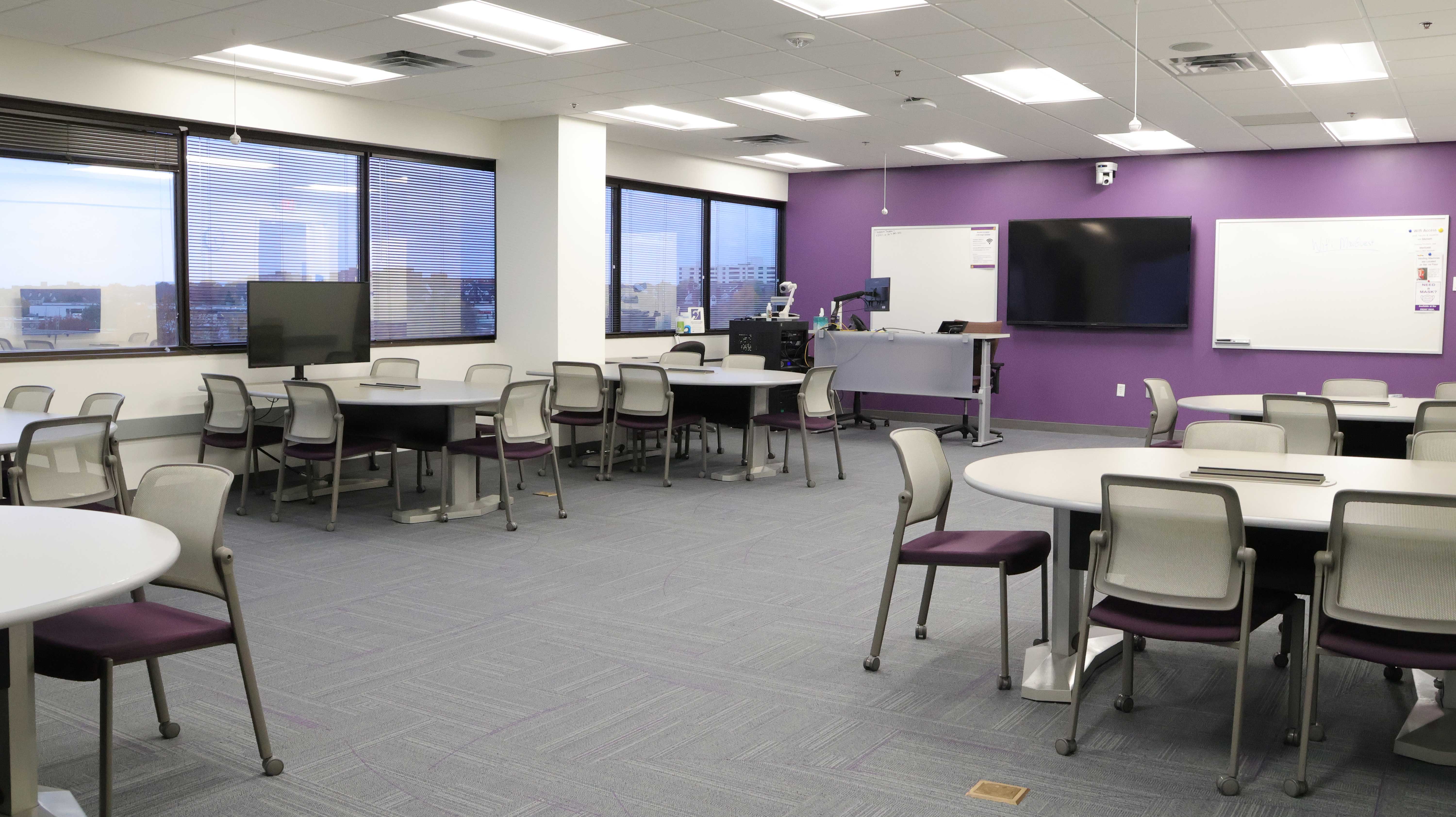 a room with tables and chairs