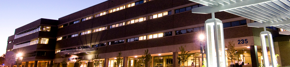 The main entrance of Saint Paul college at sunset