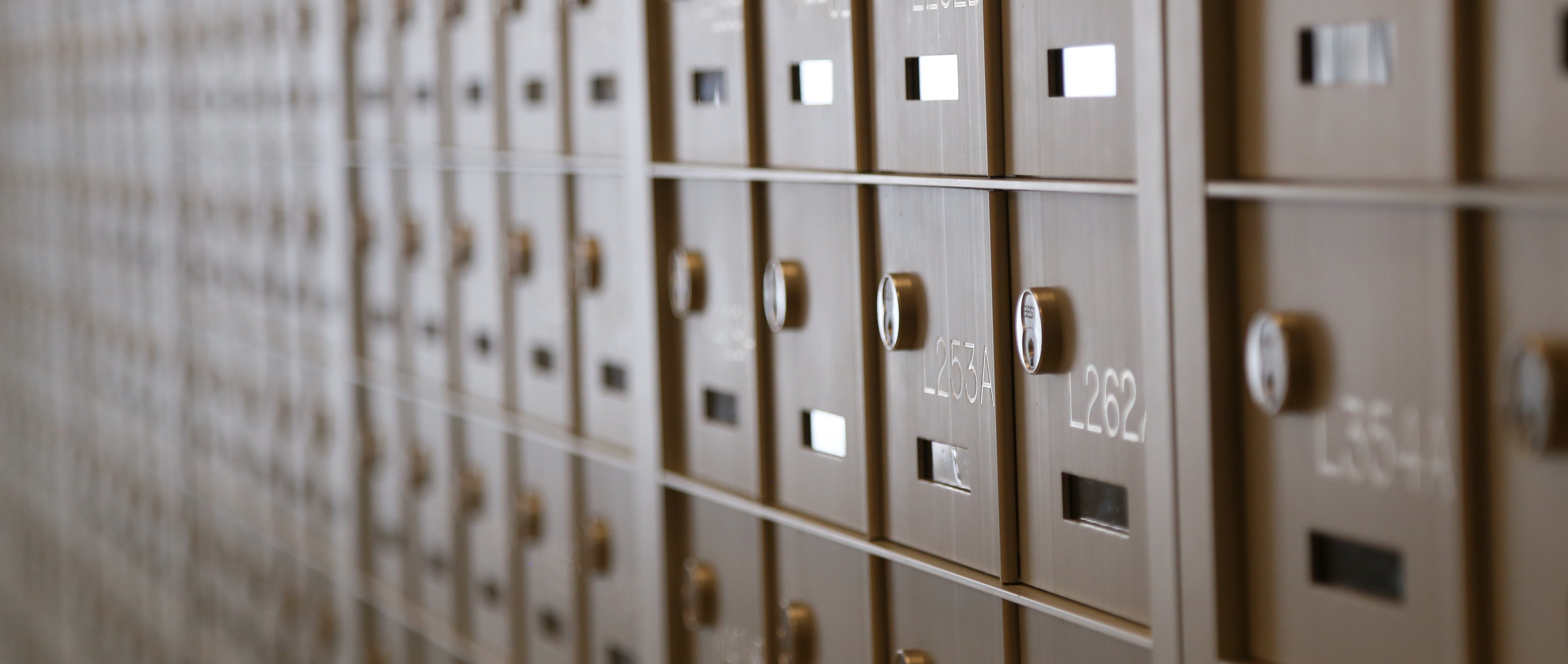 A photo of stacked mail boxes on the wall for students in the residential halls at Minnesota State University Mankato