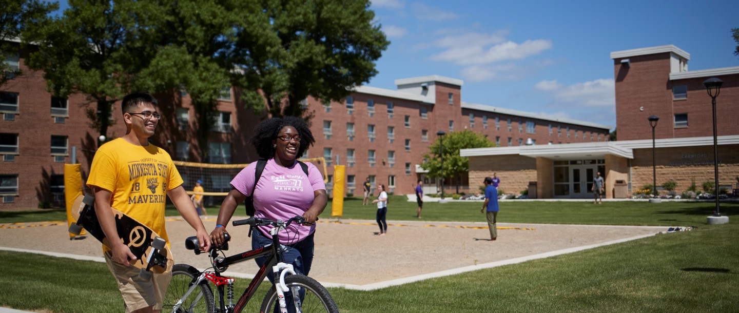 Students in front of the Crawford Residence Community building