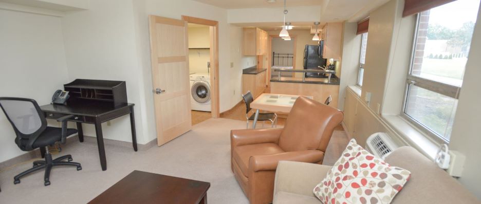 View of living room, dinning area and kitchen inside the A Hall Resident staff apartment