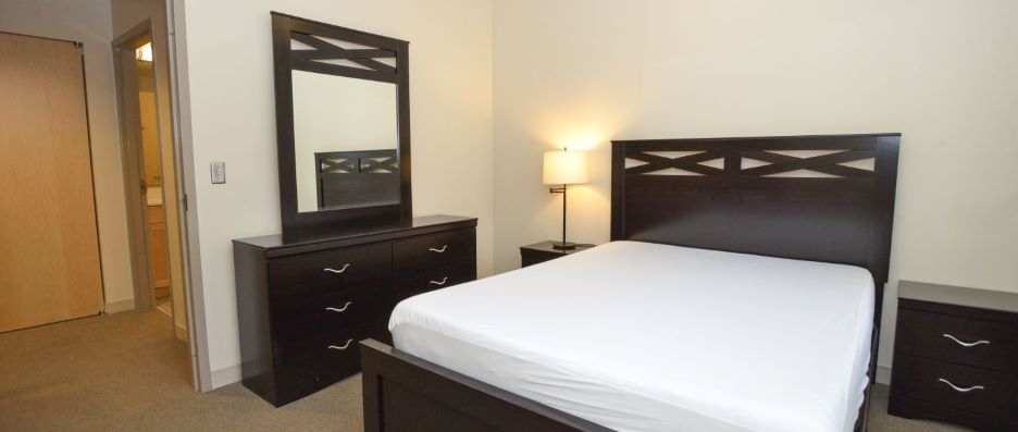 View of bedroom inside the PS 107 Hall Resident staff apartment