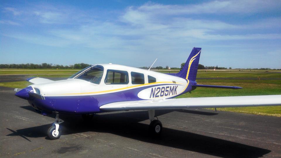 a small airplane on a runway