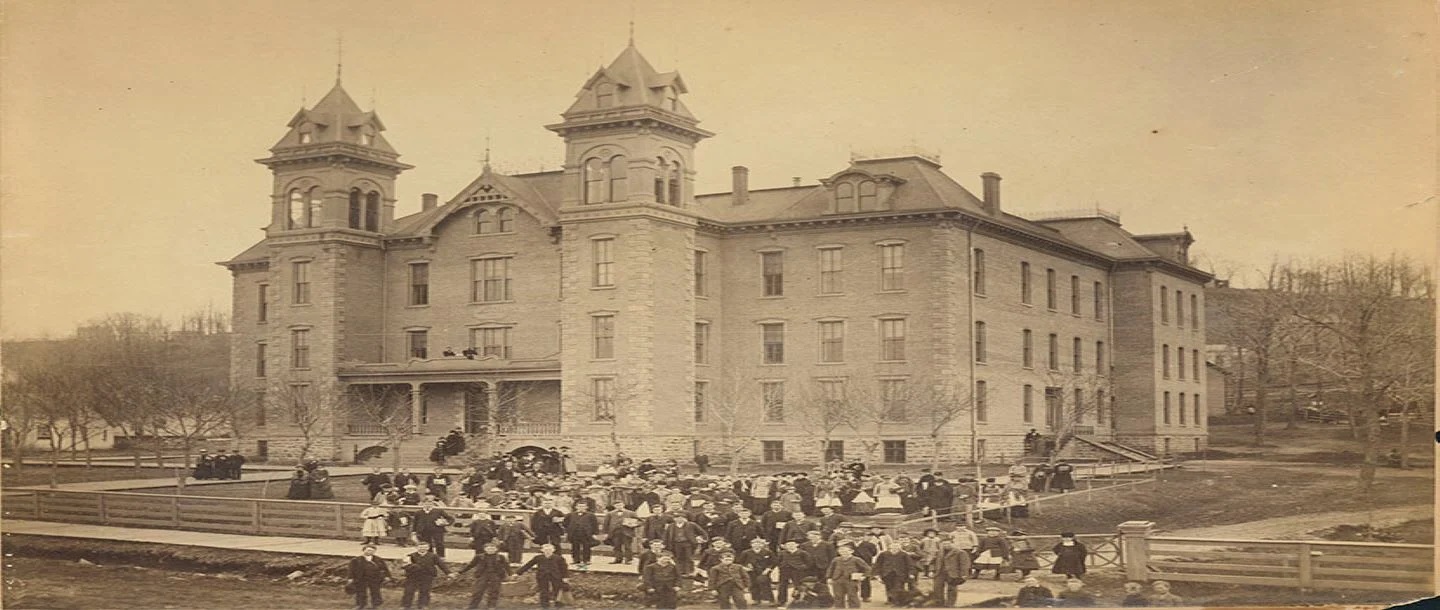 a group of people outside a building