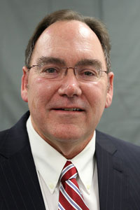 a close-up of a person wearing glasses